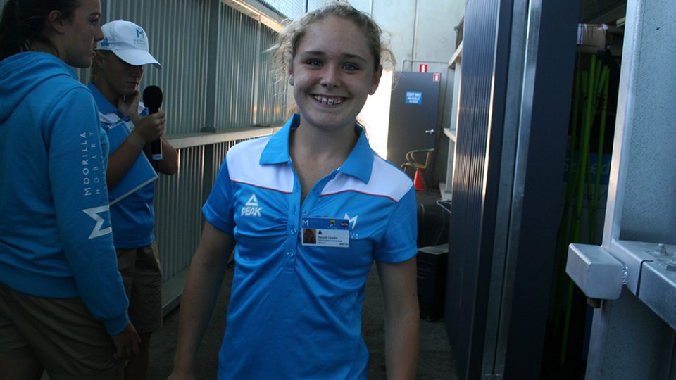 Hannah looking happy on a long day