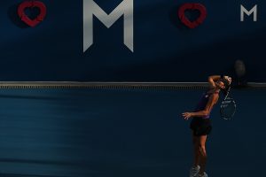 Chanelle Scheepers serves during the twilight match against Mona Barthel