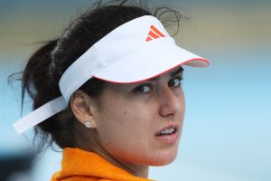 Sorana Cirstea watching on during her rain delayed match