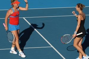 Timea Babos and  Mandy Minella