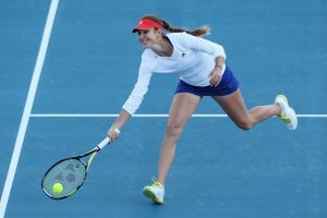 World no. 1 junior Belinda Bencic stretches for a ball