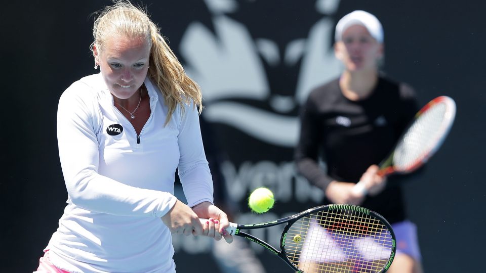 Kiki Bertens and Johanna Larsson, background, claimed the Hobart International doubles title. Picture: Getty Images