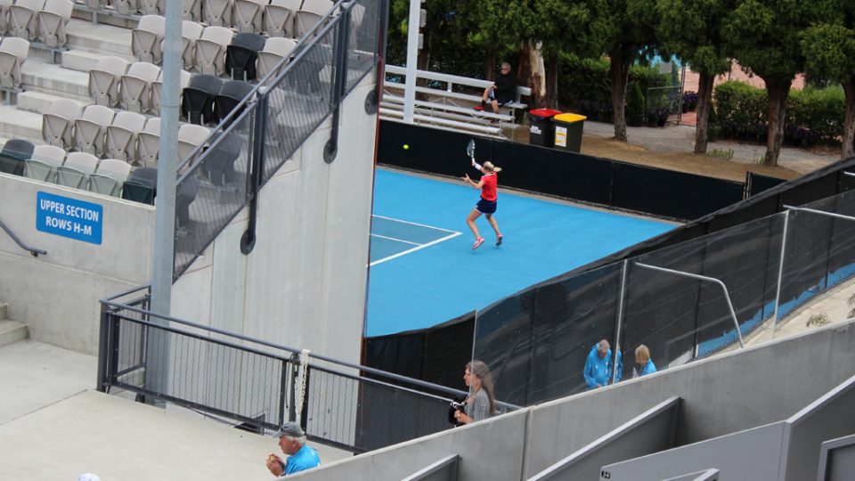 Behind the Centre Court stands, Denisa Allertova hits a forehand against Kiki Bertens. Picture: Michael Beattie